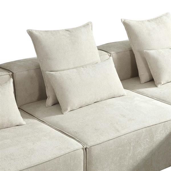 Divano modulare con penisola in tessuto beige 323x118-205x68 cm - Deluxe