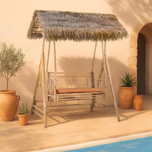 Dondolo da giardino in bamboo con tetto in fronde di palma con cuscini terracotta